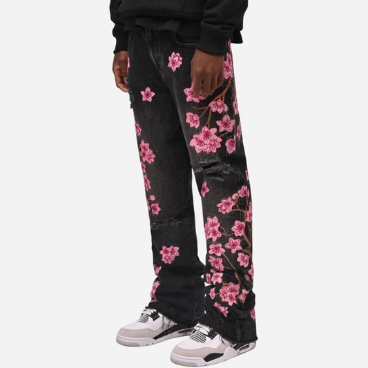 Men's graphic floral embroidered distressed straight leg denim jeans in black, side view