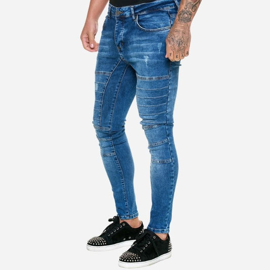 Men's panel moto jeans biker style tapered leg denim pants in navy, side view