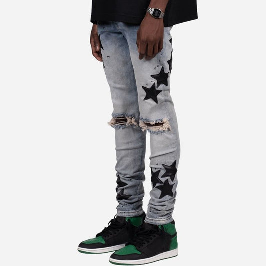 Men's star patch distressed skinny jeans in grey, side view
