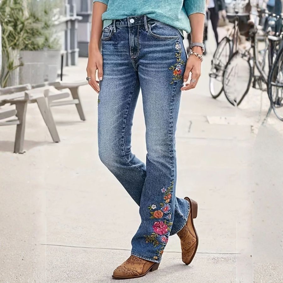 Floral embroidered skinny jeans 70's retro women's low rise slim fit stretch denim, side view