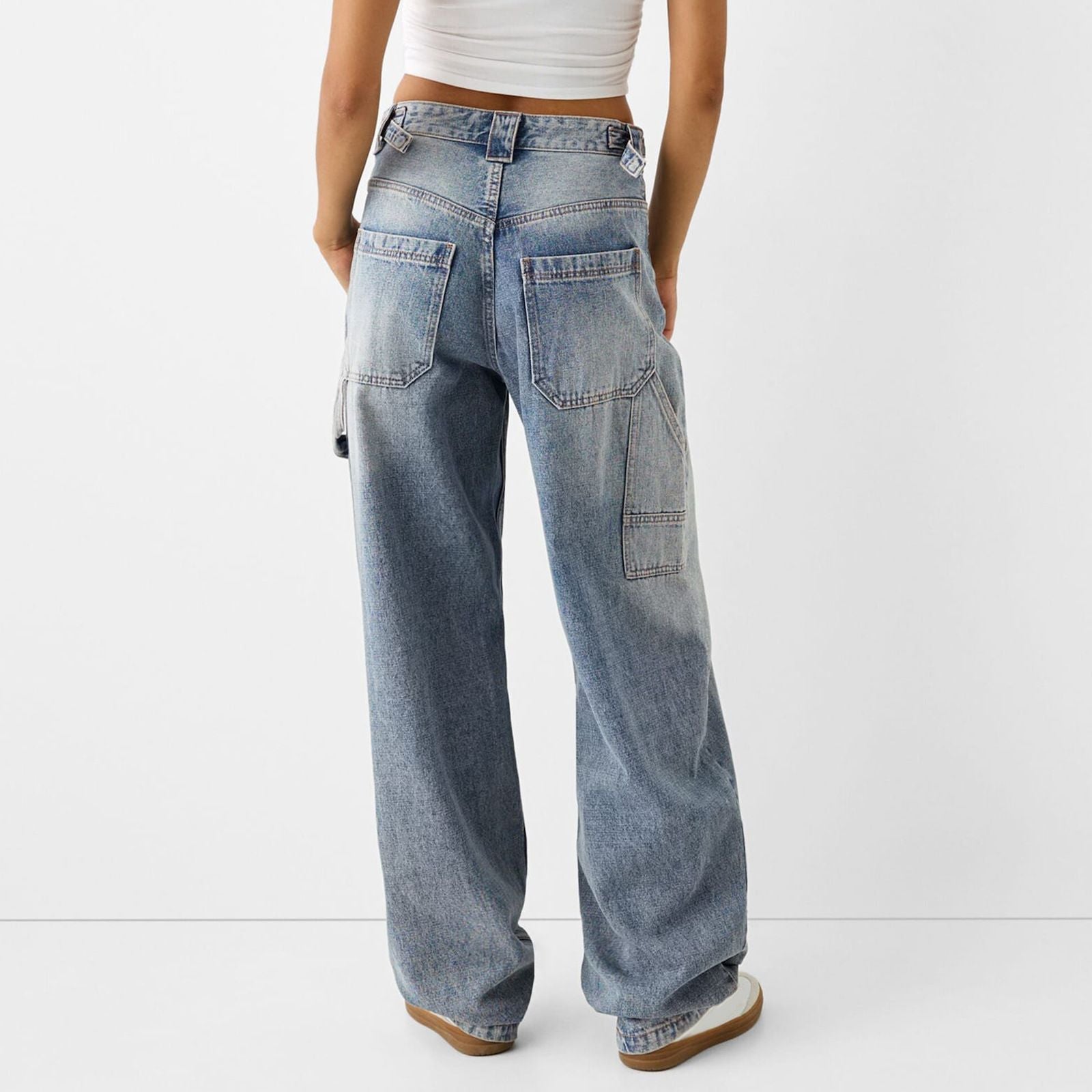 High waisted baggy wide leg jeans for women with cargo pockets denim in blue, back view