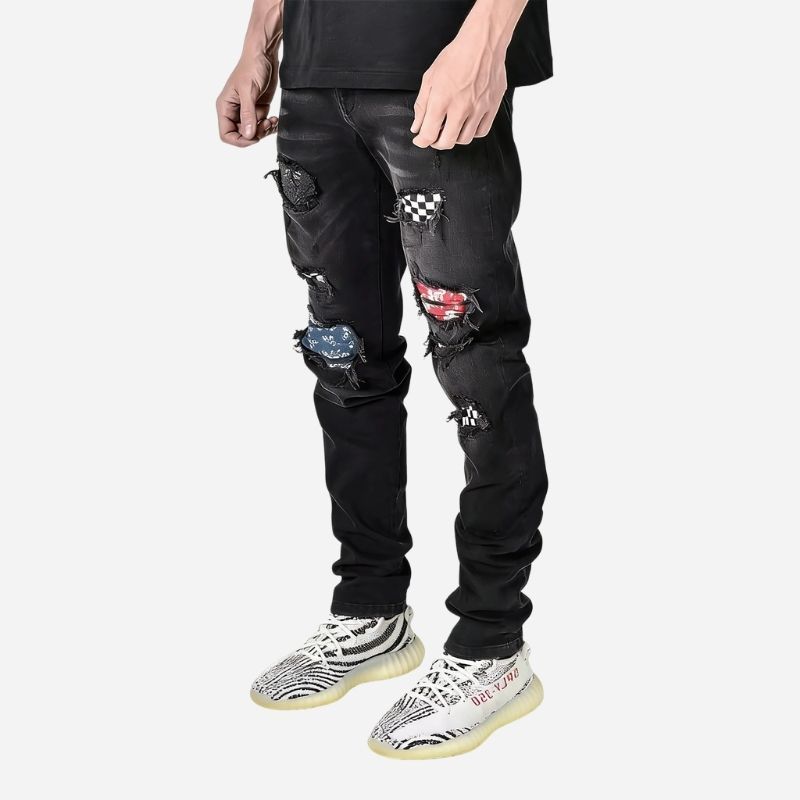 Men's ripped slim fit skinny jeans in black printed, side view