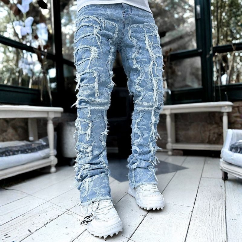 Stacked jeans men‘s skinny denim pants in blue printed, front view