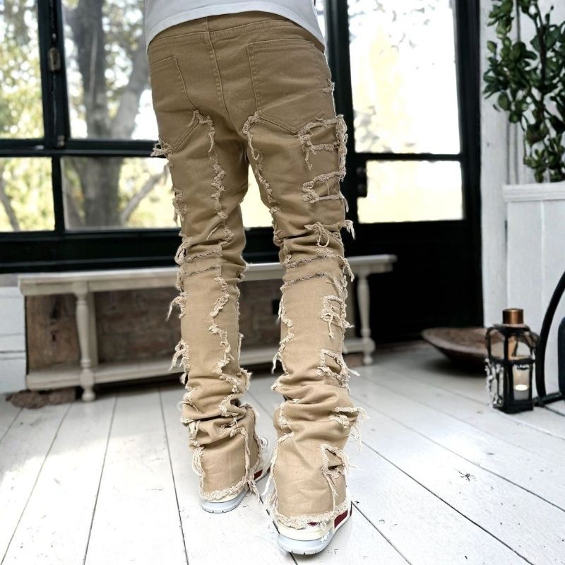Stacked jeans men‘s skinny denim pants in khaki, back view