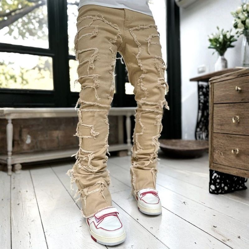 Stacked jeans men‘s skinny denim pants in khaki, front view