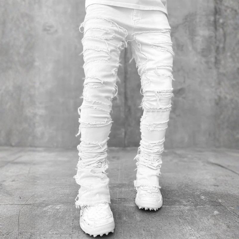 Stacked jeans men‘s skinny denim pants in white, front view