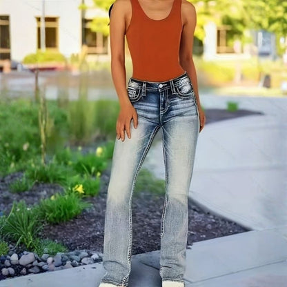 Women's mid rise bootcut jeans with embroidered back pockets denim pants, front view