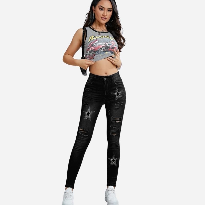 Women's ripped skinny jeans star print denim in black, front view