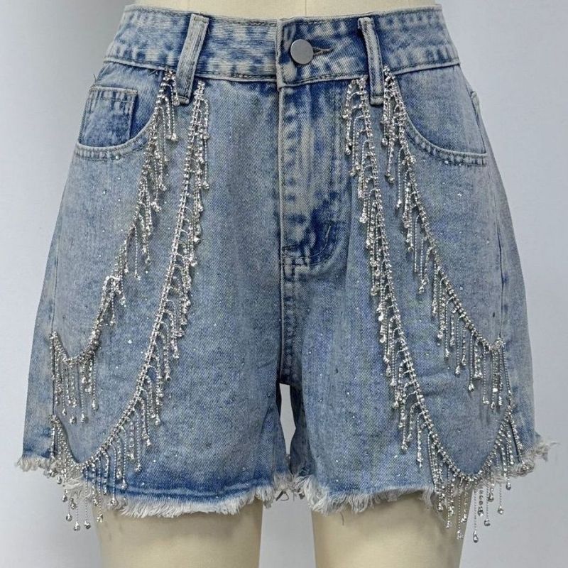 Women's rhinestone fringe chain denim shorts in blue, front view