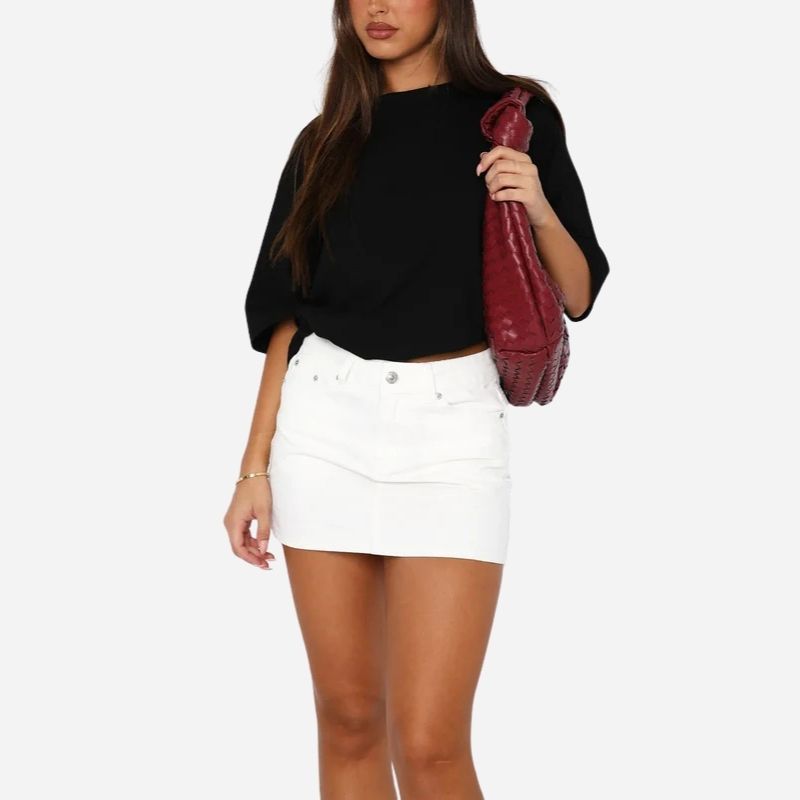 Women’s denim mini skirt slim fit low waist bodycon jean skirt in white, front view