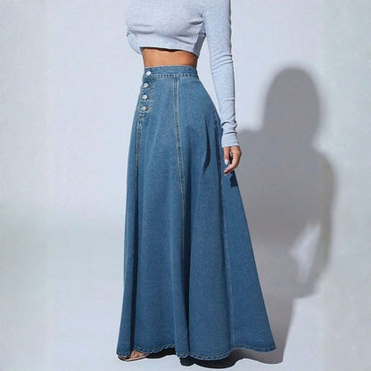 Women’s high waist button fly a-line flared long denim maxi skirt in navy, side view