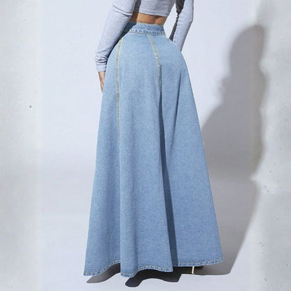 Women’s high waist button fly a-line flared long denim maxi skirt in blue, back view